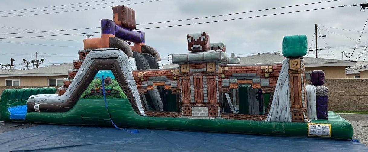 Kids racing the Mining Mania mining-themed obstacle course rental in Chicago